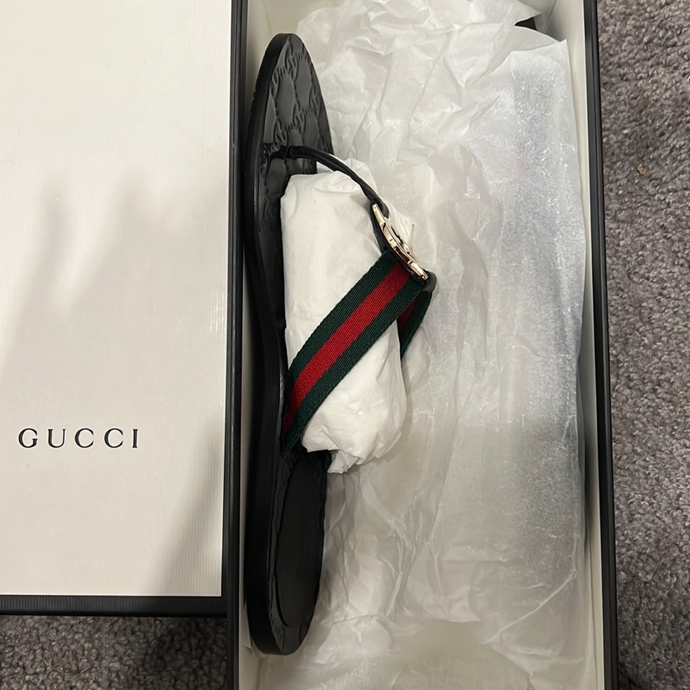 Gucci flip flops worn once brand new